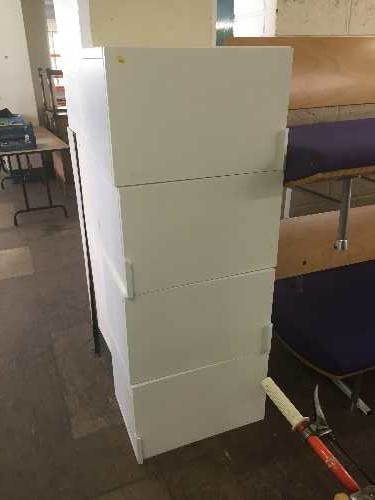 Four white single door cabinets