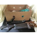 Two boxes of assorted hand tools, braces saws, etc and metal cans,