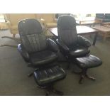 A pair of black leather swivel armchairs with stools