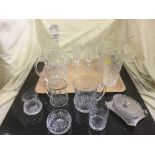 A tray of lead crystal drinking glasses, ship's decanter, water jugs,