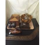 A tray of carved boomerang, walnut trinket box, fruit bowl, oil lamp,