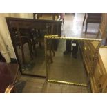 A gilt framed mirror and a mahogany framed mirror