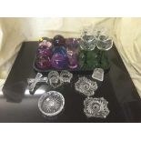 A tray of drinking glasses, assorted paperweights, knife rests,