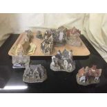 A collection of David Winter miniature houses with certificates