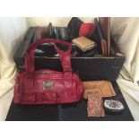 Two boxes of lady's hand bags, tapestry wall hanging,