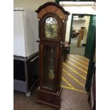 A Bentima longcase clock with pendulum and weights