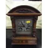 An Edwardian walnut mantel clock (complete)