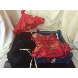 A basket of oriental Kimono, matching handbag,