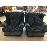 Four green upholstered lounge chairs with leather trim