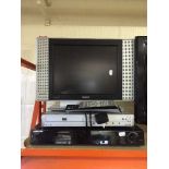 A Phillips 15 inch LCD TV with remote,