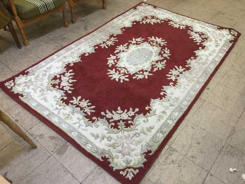 A red floral rug