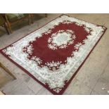 A red floral rug