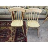 A set of four pine kitchen chairs