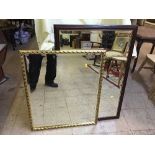 A gilt framed mirror and a mahogany framed mirror