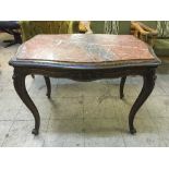 A carved oak marble topped centre table on cabriole legs