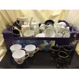 Two boxes of glass ware, cutlery, tea china,