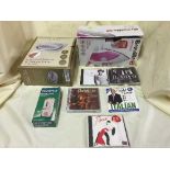 A Hoover vac cleaner, box of CD's, DVDs, chess set,