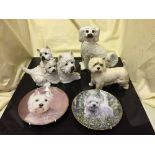 A box of Staffordshire dog, West Highland terrier collector's plates and dogs,