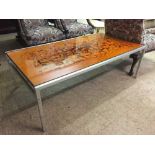 A late 20th century chrome based designer coffee table - signed