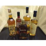 A basket of assorted spirits - Captain Morgans Spiced Rum, Southern Comfort,