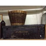 A mid 20th century metal trunk and a wicker log basket