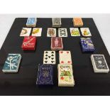 A large quantity of early twentieth century playing cards/games to include 'Main Line' by Waddy's,