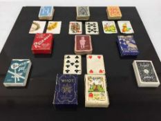 A large quantity of early twentieth century playing cards/games to include 'Main Line' by Waddy's,