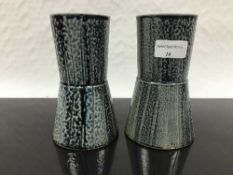 Jane Hamlyn (born 1940): A pair of salt glazed vases, in blue glaze, waisted form,