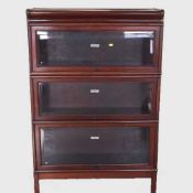 A Globe Wernicke three tier mahogany stacking bookcase, width 86 cm.