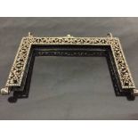 A Continental silver Art Deco purse border, with stylized fret-cut frame,