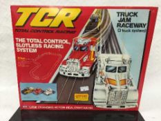 Two TCR (Total Control Racing) sets : Indy Jam Circuit and Truck Jam Raceway, both parts boxed.
