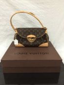 Louis Vuitton : A lady's Beverly hand bag, monogram canvas with tan trim,