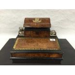 A Victorian burr walnut, ebonised and brass mounted writing box, with two glass inkbottles,