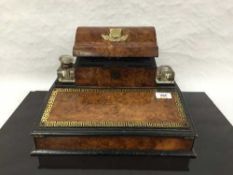 A Victorian burr walnut, ebonised and brass mounted writing box, with two glass inkbottles,