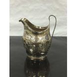 A George III silver milk jug, William Hall, London 1799, height 10.5cm, 91.7g.