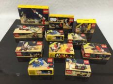 Eight Lego sets, relating to space, including numbers 886, 897, 6701, 6821, 6822, 6841 and 6842,