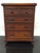 A late Victorian miniature chest of drawers, an apprentice piece,