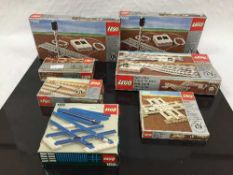 Eleven Lego sets, all railway motors and related items, numbers 107, 107, 107, 159, 7850, 7854,