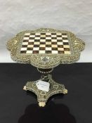 A fine nineteenth century Vizagapatam ivory and tortoiseshell chess table, height 22 cm.