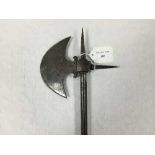 An eighteenth century Eastern cavalryman's axe, the crescent blade with faint etching,