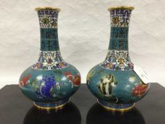 A pair of Chinese gilt bronze cloisonne vases, decorated with fish and crustaceans,