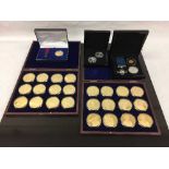 A limited edition 12 coin gold plated proof set 'Portraits of the Queen', in velvet lined case,