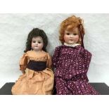 A Simon and Halbig bisque headed doll numbered 1909 7 1/2,