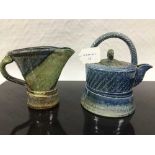 Jane Hamlyn (born 1940): A salt glaze teapot, in blue/green glaze, incised decoration,