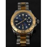 A Gentleman's Rolex Yachtmaster Oyster Perpetual wrist watch, with blue dial,