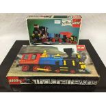 Four Lego sets, all relating to trains, numbers C148, 171, D396 and 7822, all parts boxed.