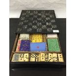 A Victorian papier mache and mother of pearl games box, circa 1880,