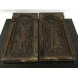 A pair of nineteenth century carved oak wall panels decorated with noble figures, 45cm.