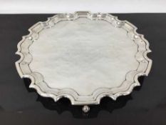 A silver salver with presentation inscription ' Winner of the Tennents Scottish Stewards Cup on