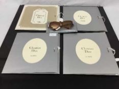 Christian Dior : Four silk scarves, with original tissue and card sleeves,